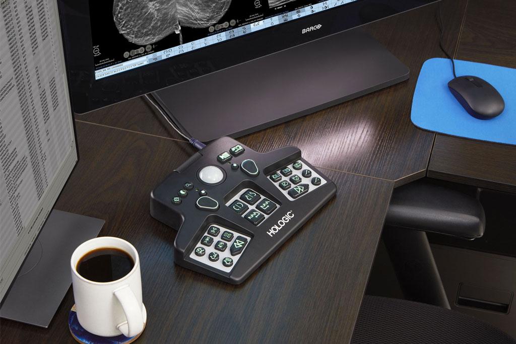 Medical device and monitor on desk in dark office